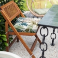 Poduszka siedzisko na taras 40x40x5 GARDEN 02 zielona/beżowa w liście wodoodporna z troczkami  